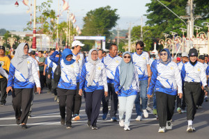 Jalan Sehat HUT ke-54 KORPRI Kabupaten Kebumen, Warga Prumpung dan Pegawai Puskesmas Alian Raih Sepeda Listrik